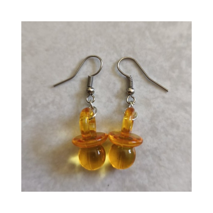 Ohrhänger mit Schnullern Transparent Orange